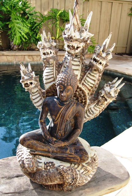 Hand carved Buddha on 5 Naga Celadon