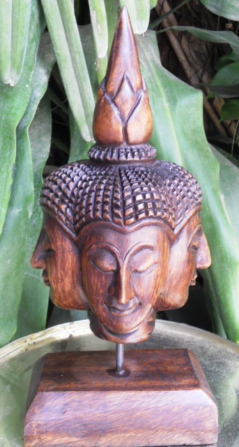 Four Face Buddha Head on stand